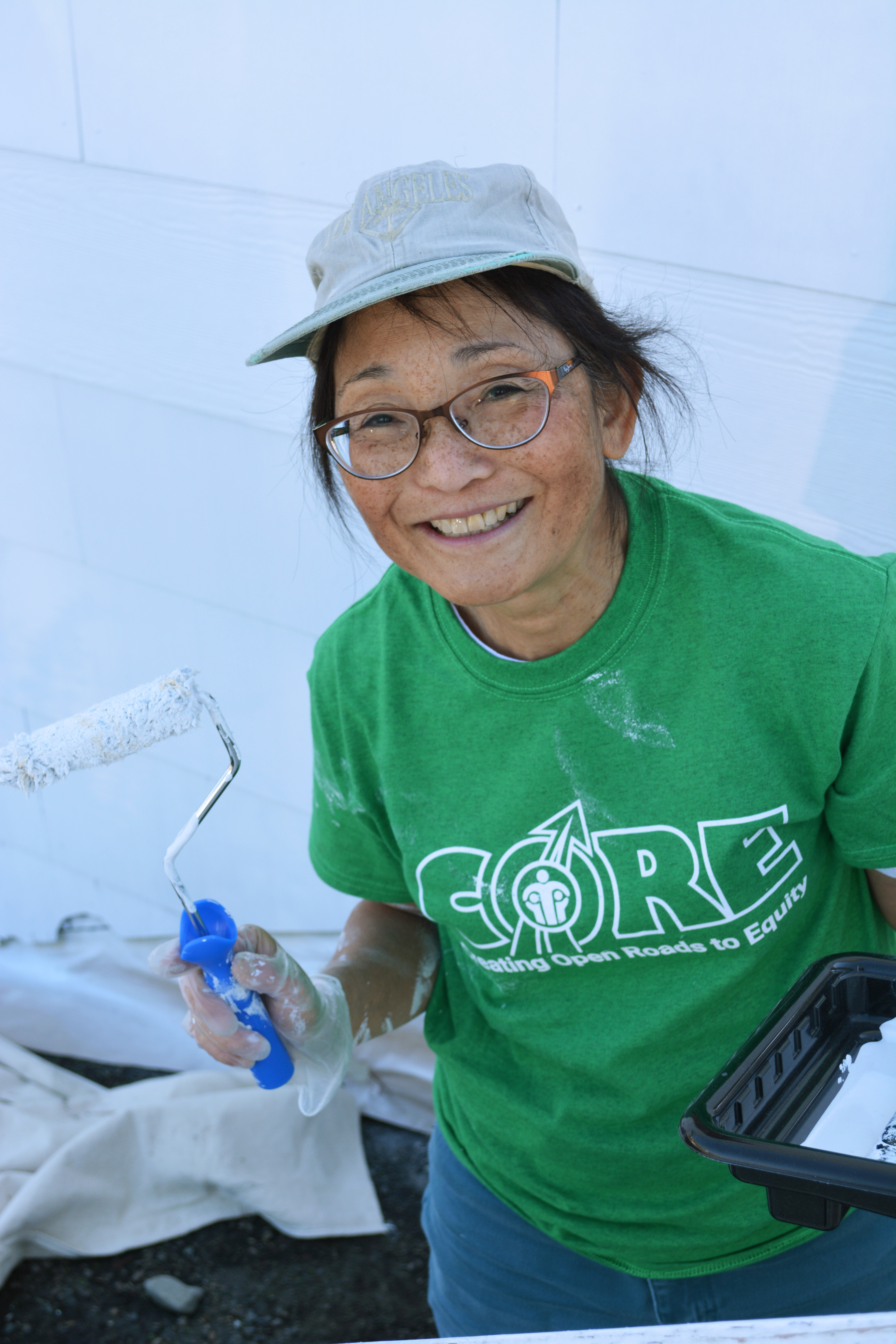 Volunteers painting Homeward House