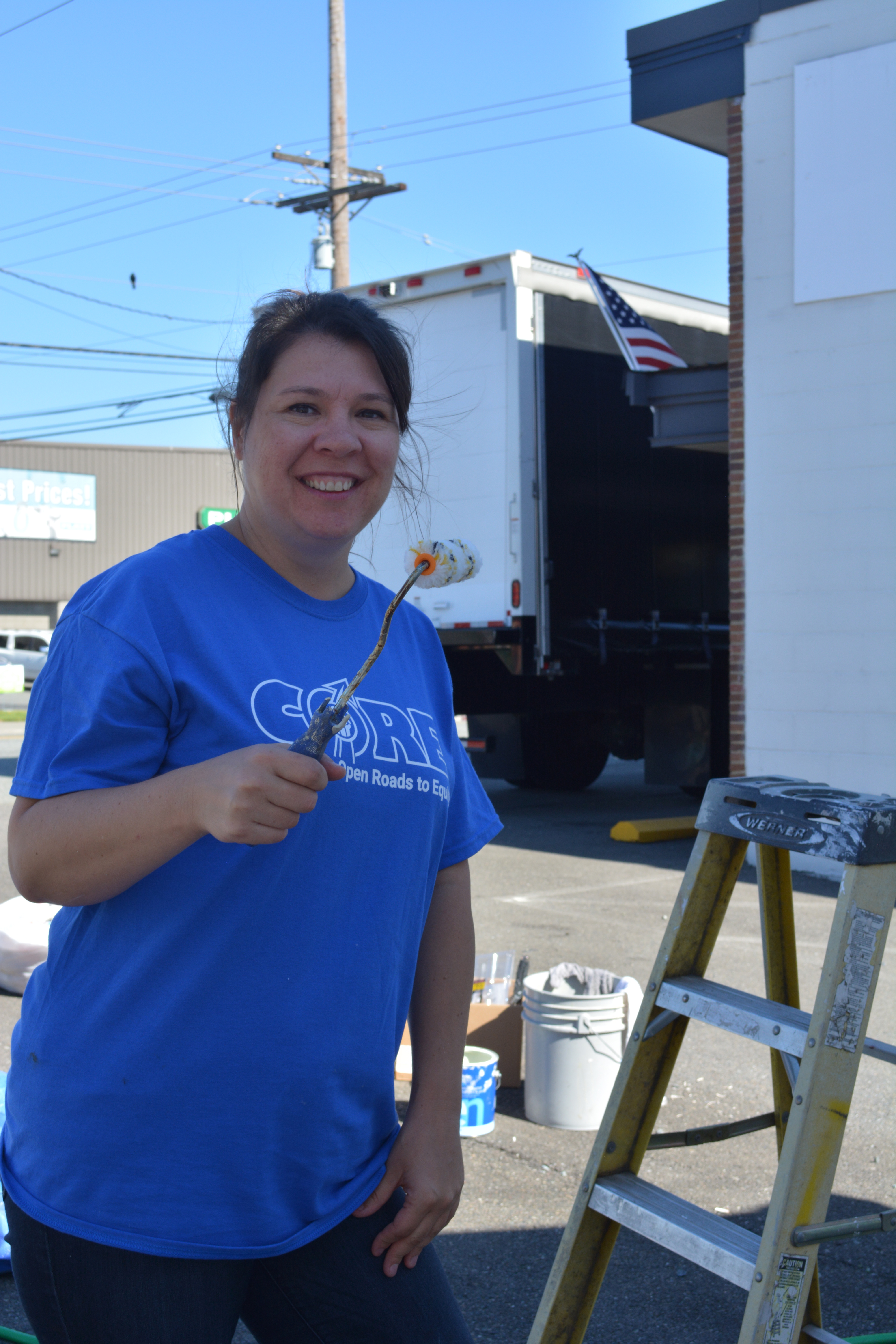 Volunteers painting Homeward House